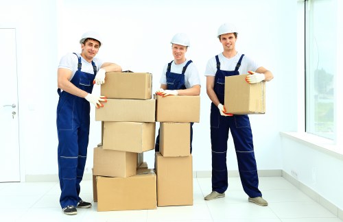 Packed boxes and furniture ready for moving truck transport in Hook