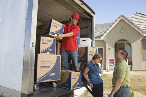Packed boxes and home moving supplies for a Hook removal service