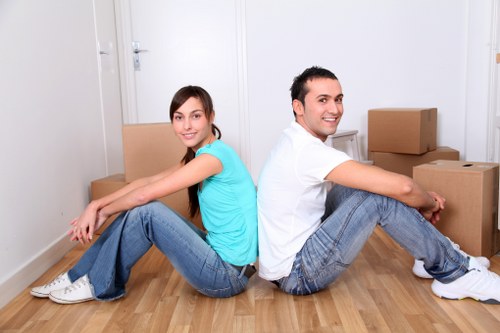 Removal van service handling a residential move with careful loading