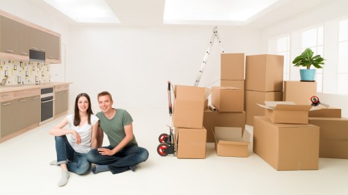 Removal team loading household furniture and boxes for a move in Hook