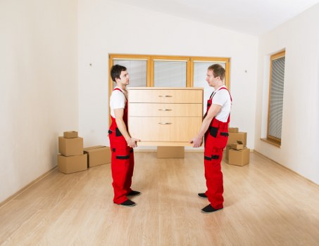 Removal van loading household items in a Hook property