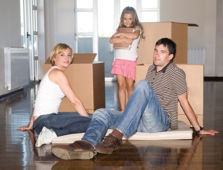 Loading furniture into a removals van near Hook